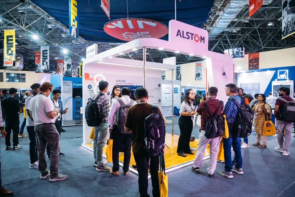 Attendees gathered at a Cypher AI expo booth