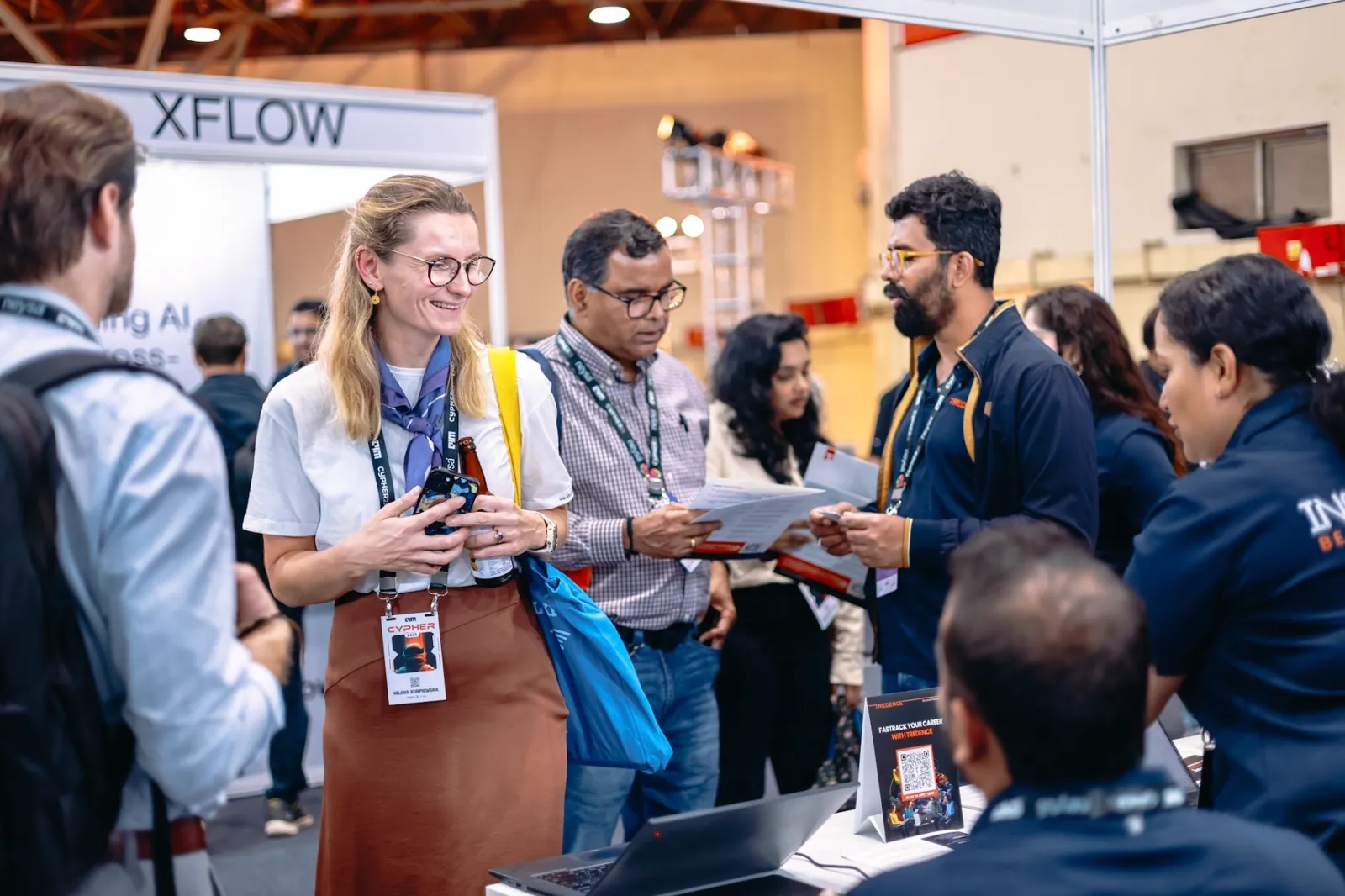 Delegates connecting on the Cypher expo floor